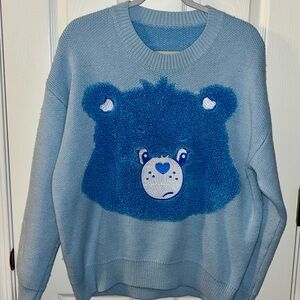 ROMWE Care Bears Grumpy light blue sweater size M gently used
